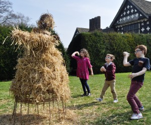 Young visitors at Little Moreton Hall bombarding Jack o’ Lent. C Alan Ingram/National Trust